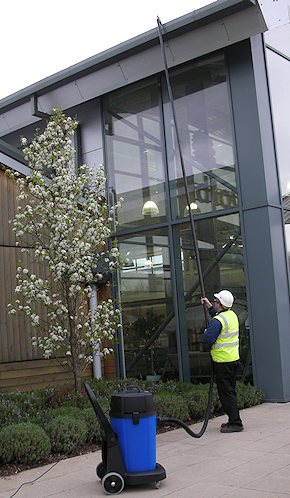 Vacuum cleaning gutters for commercial customers in Guildford